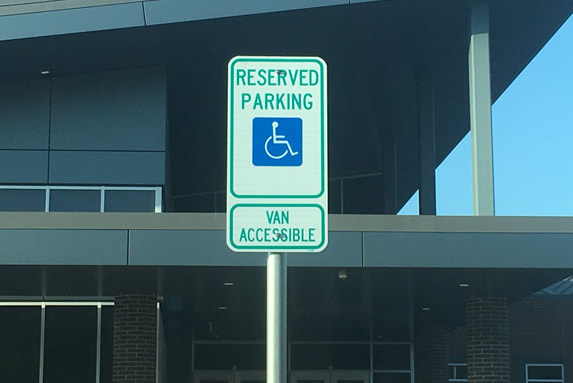Metal Signage Installation In Parking Lots